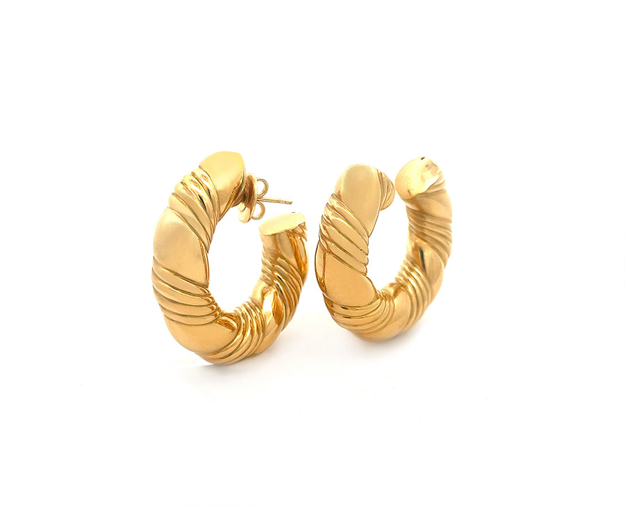 Yellow gold large twisted earrings