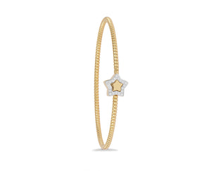 Yellow gold tubo bangle bracelet with a diamond star
