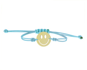 Blue rope bracelet with a yellow gold smiley charm