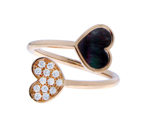 Rose gold ring with a diamond and a black mother of pearl heart