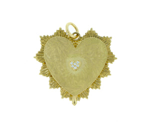 Yellow gold heart pendant with a heart of diamonds