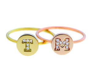 Yellow and rose gold coin ring with diamond letters