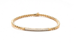 Yellow gold stretch bracelet with diamonds