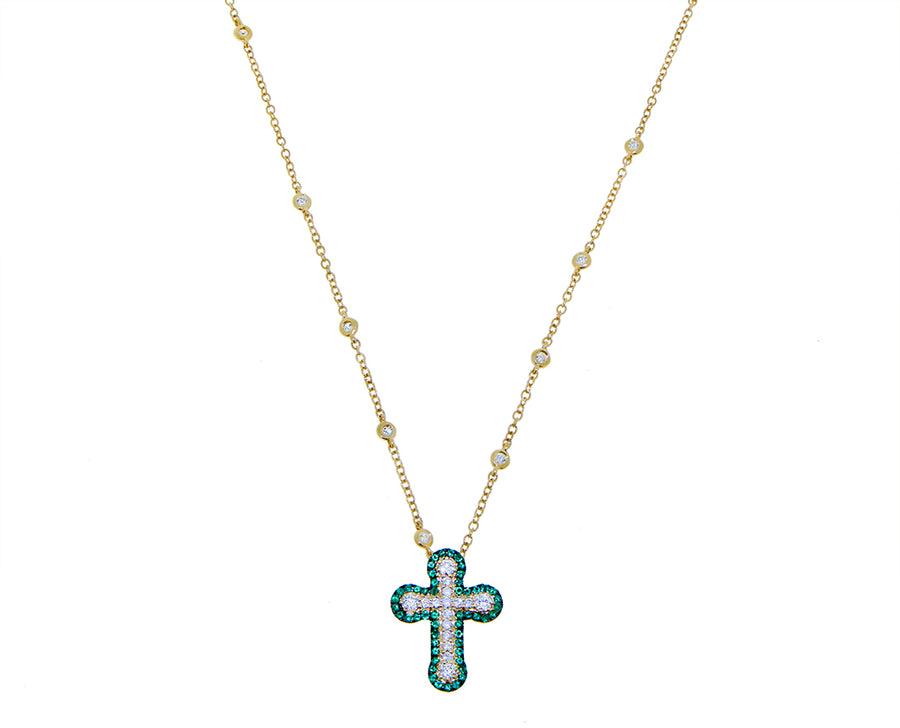 Yellow gold necklace with a diamond and emerald cross