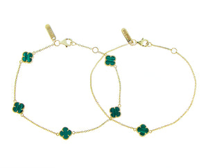 Yellow gold bracelet with tiny clovers