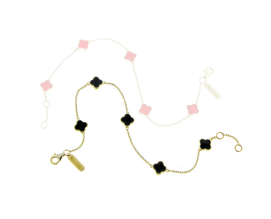 Yellow gold bracelet with a mini coral or onyx alhambra charm