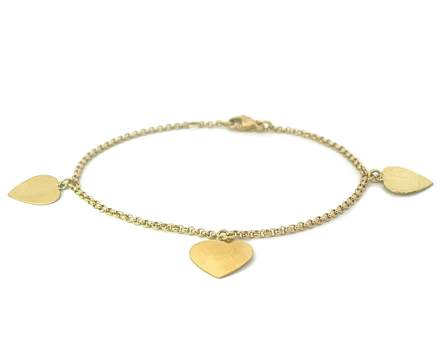Yellow gold bracelet with heart pendants