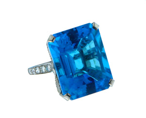 Platina ring bezet met diamant en blauwe Topaas
