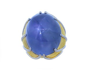 Yellow gold and platinum ring with a star sapphire
